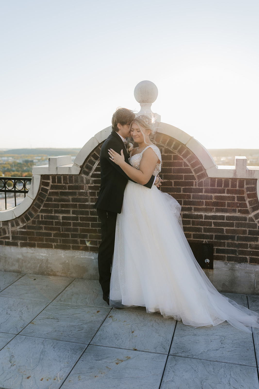 bride and groom take wedding portraits for their wedding at the Mayo Hotel