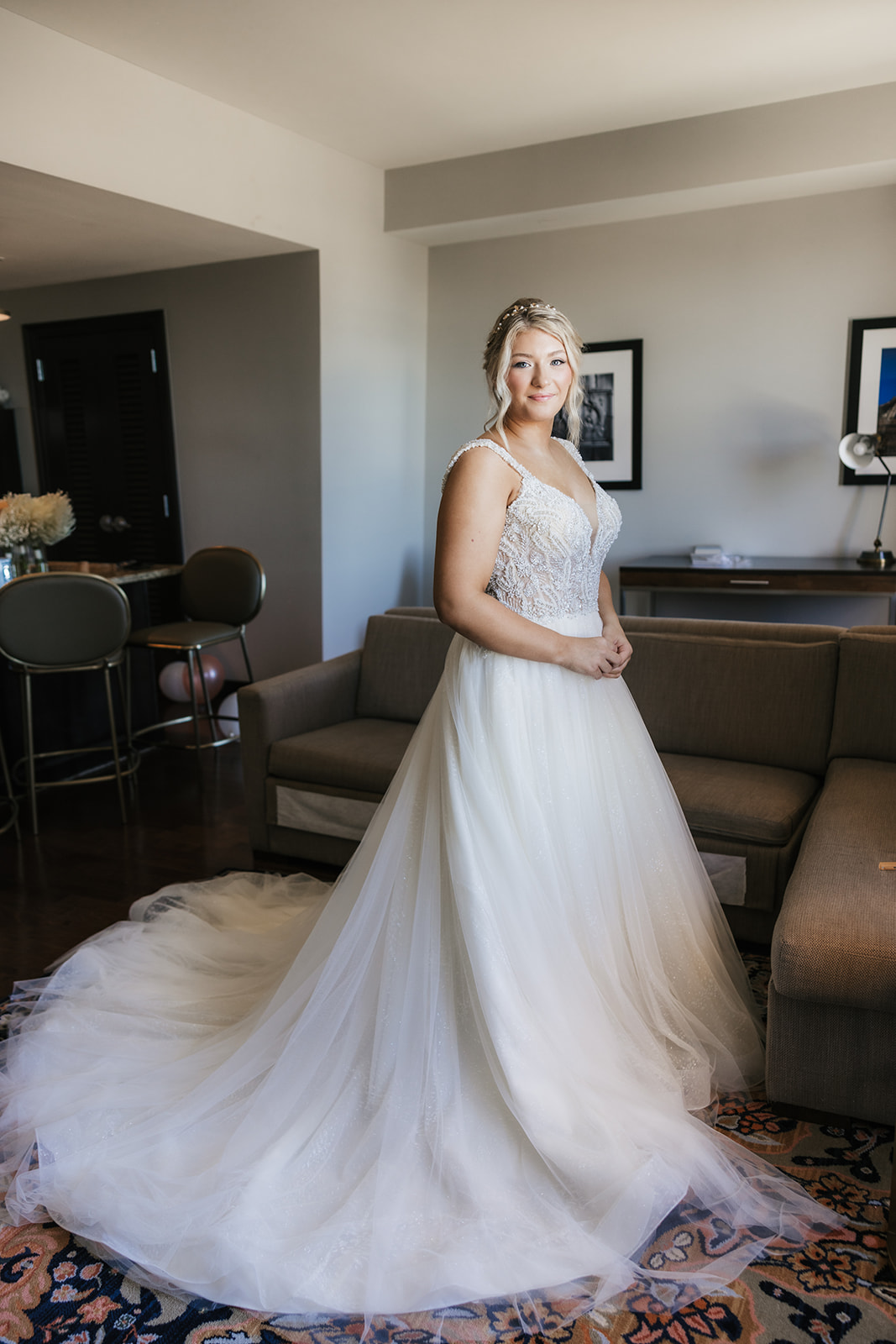 Bride getting ready with her bridesmaids for her wedding at the Mayo hotel