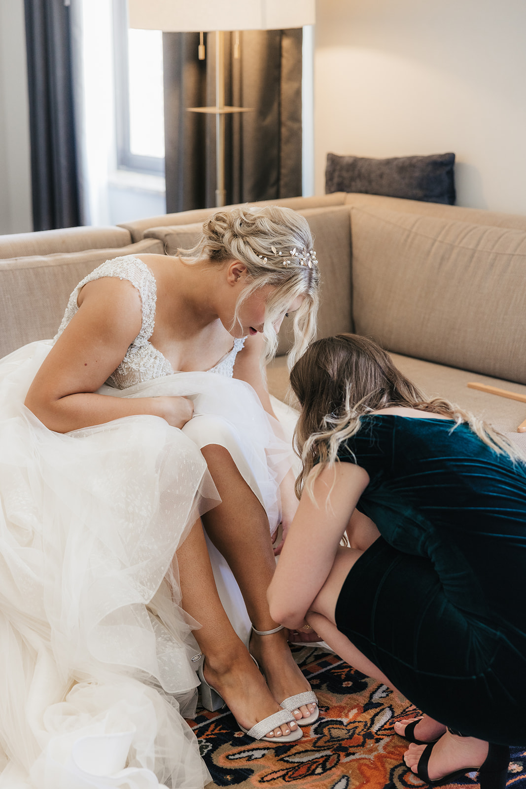 Bride getting ready with her bridesmaids for her wedding at the Mayo hotel