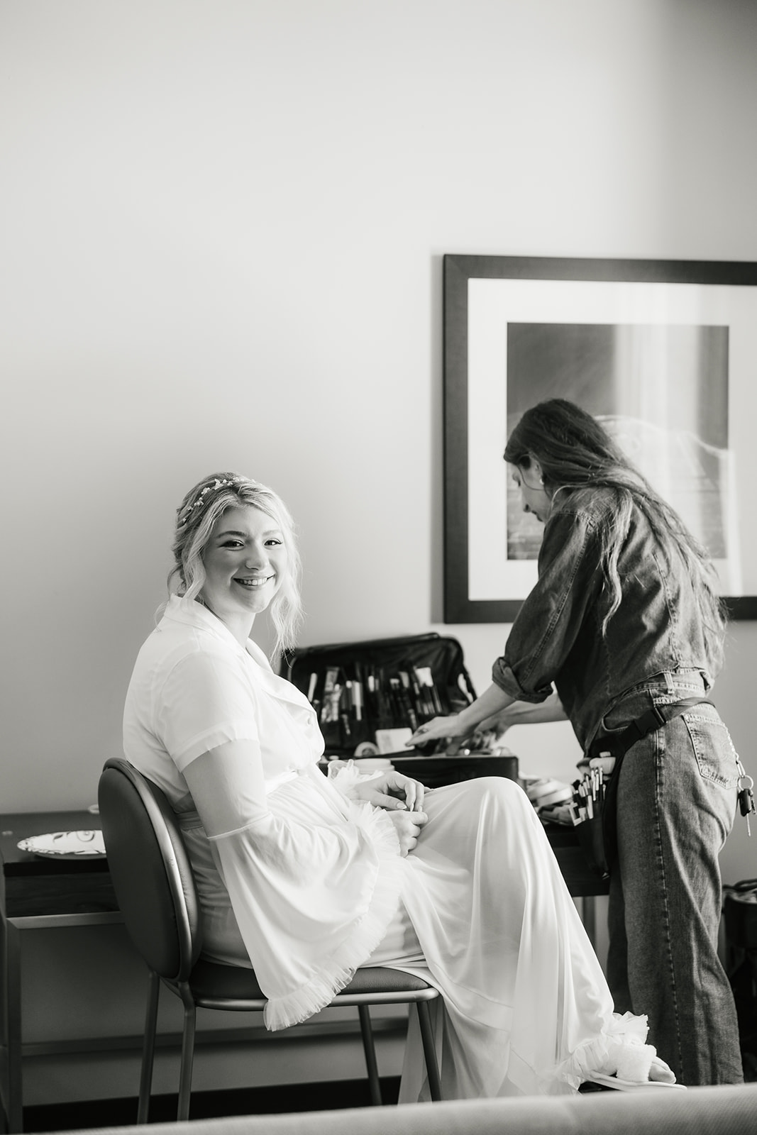 Bride getting ready with her bridesmaids for her wedding at the Mayo hotel