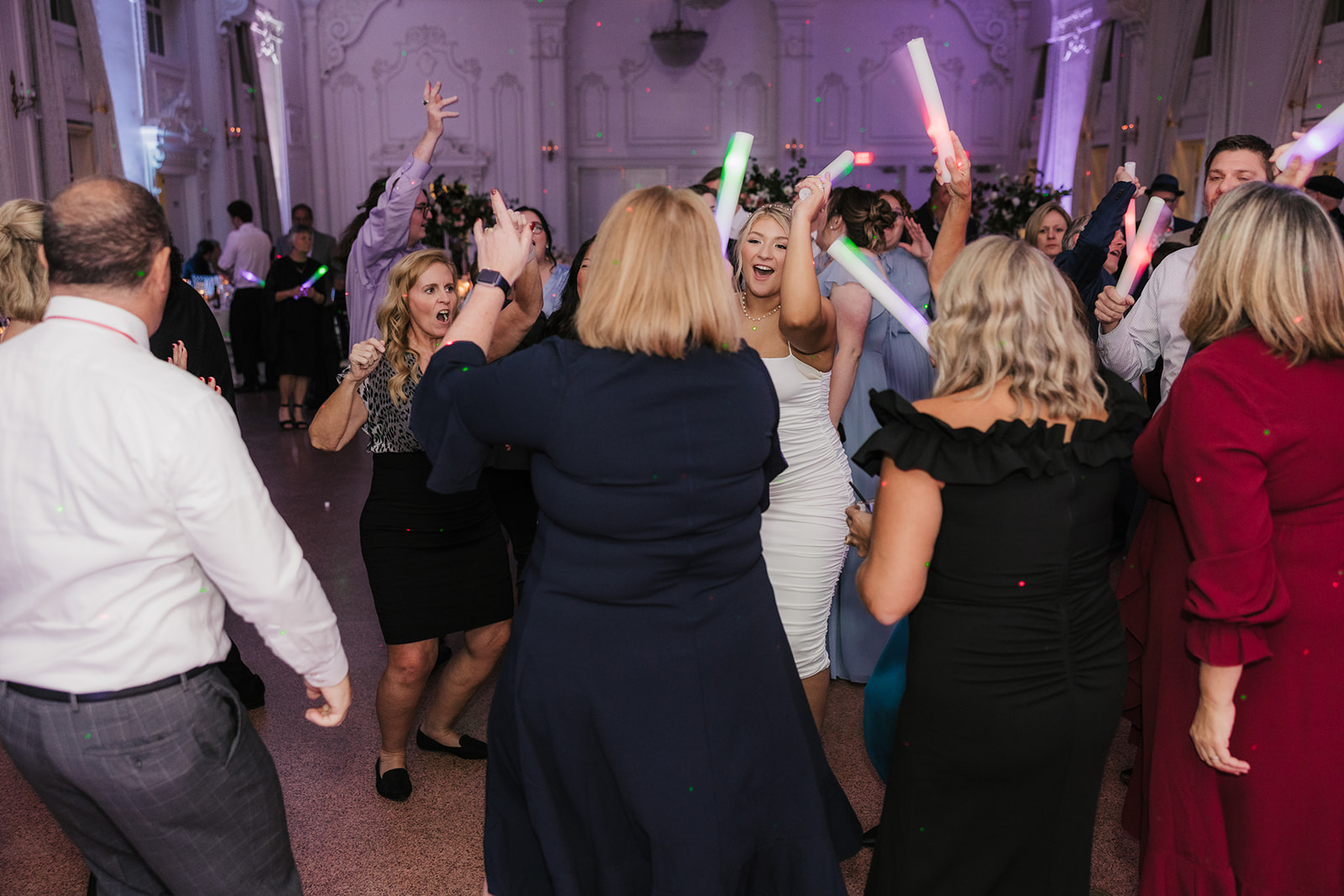 People dancing on the dance floor and having fun for a wedding reception at the mayo hotel 