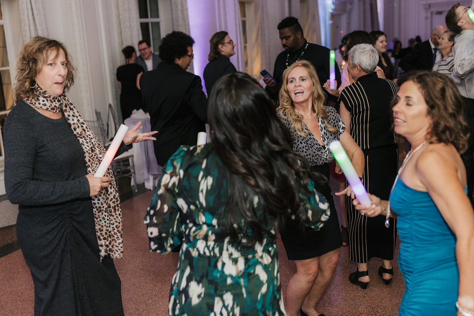 People dancing on the dance floor and having fun for a wedding reception at the mayo hotel 