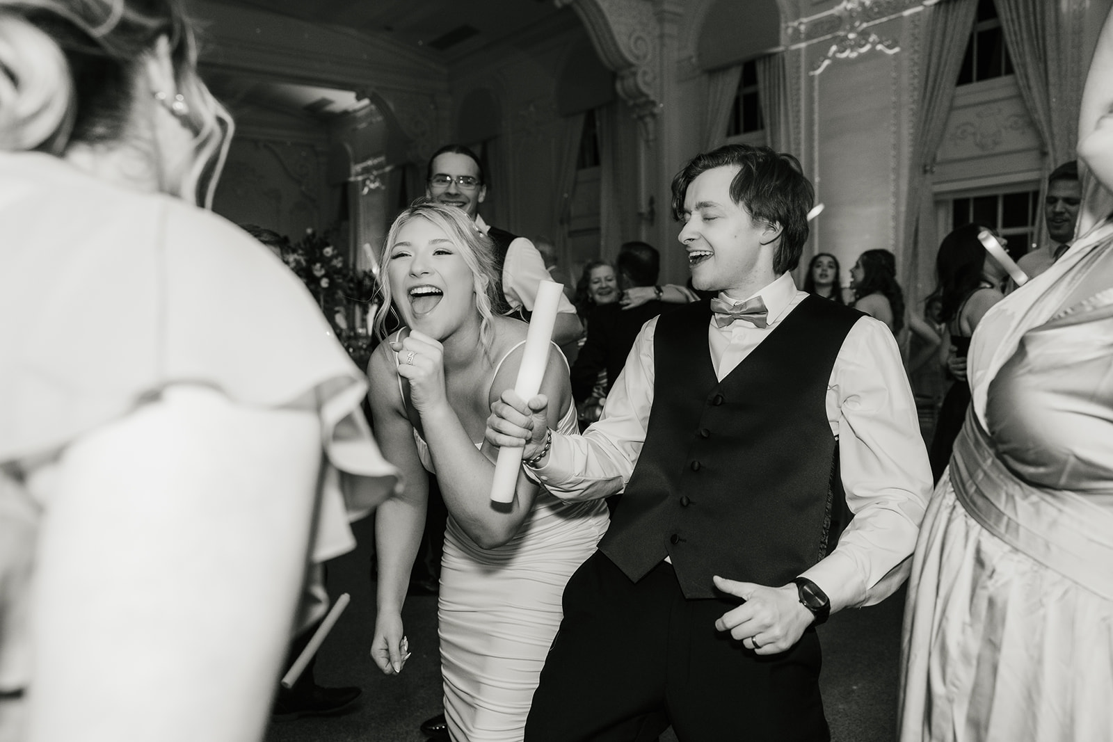 People dancing on the dance floor and having fun for a wedding reception at the mayo hotel 