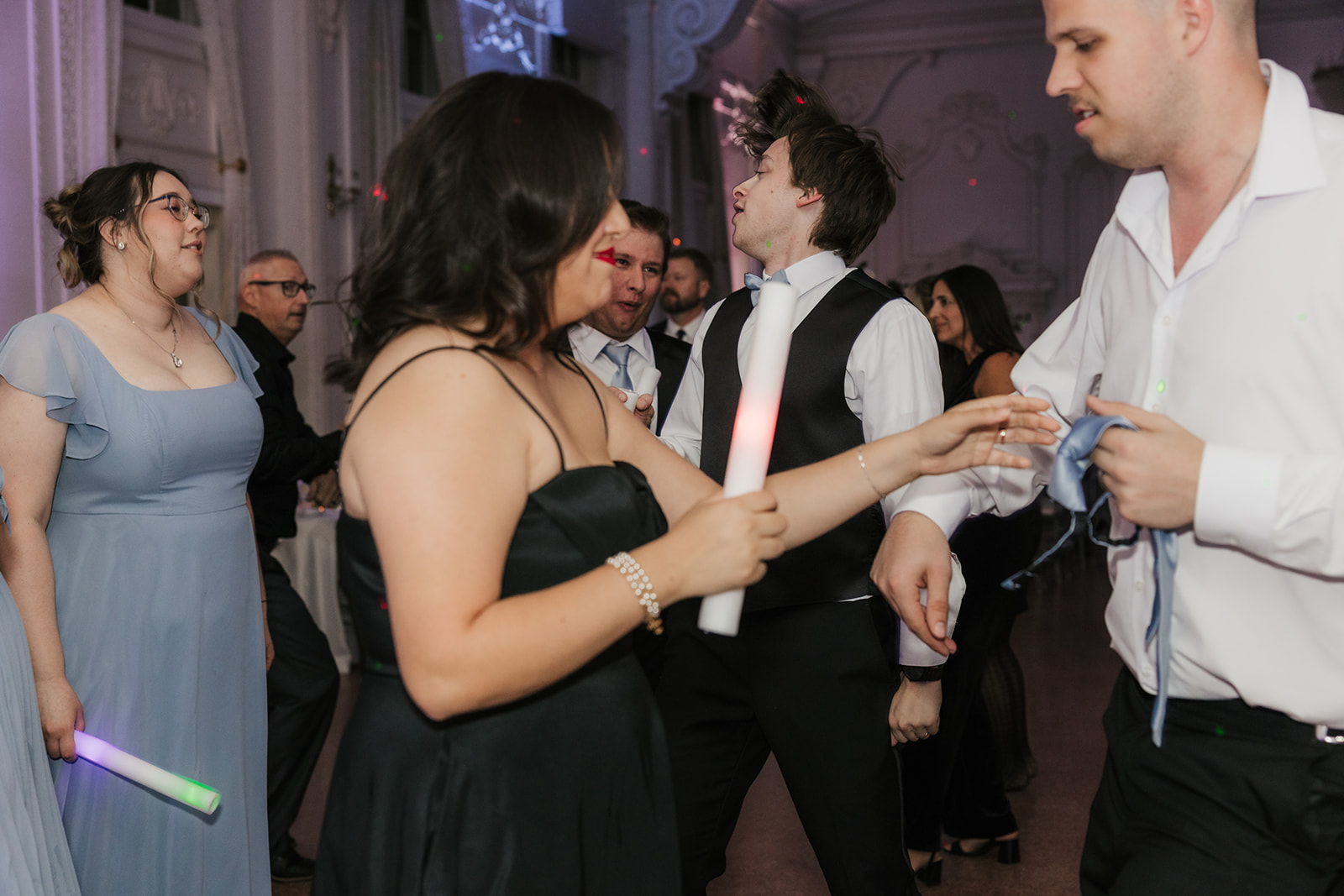 People dancing on the dance floor and having fun for a wedding reception at the mayo hotel 