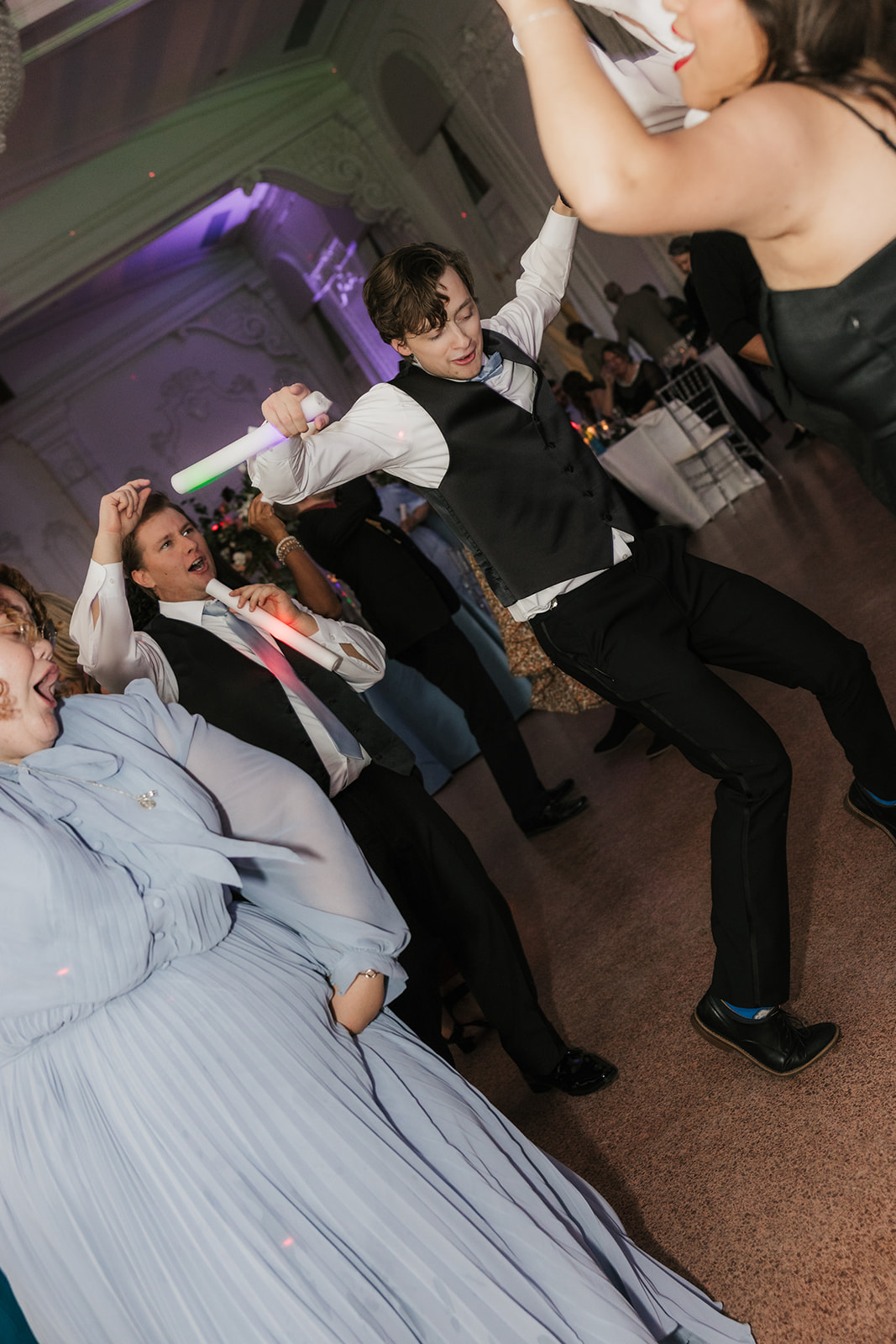 People dancing on the dance floor and having fun for a wedding reception at the mayo hotel 