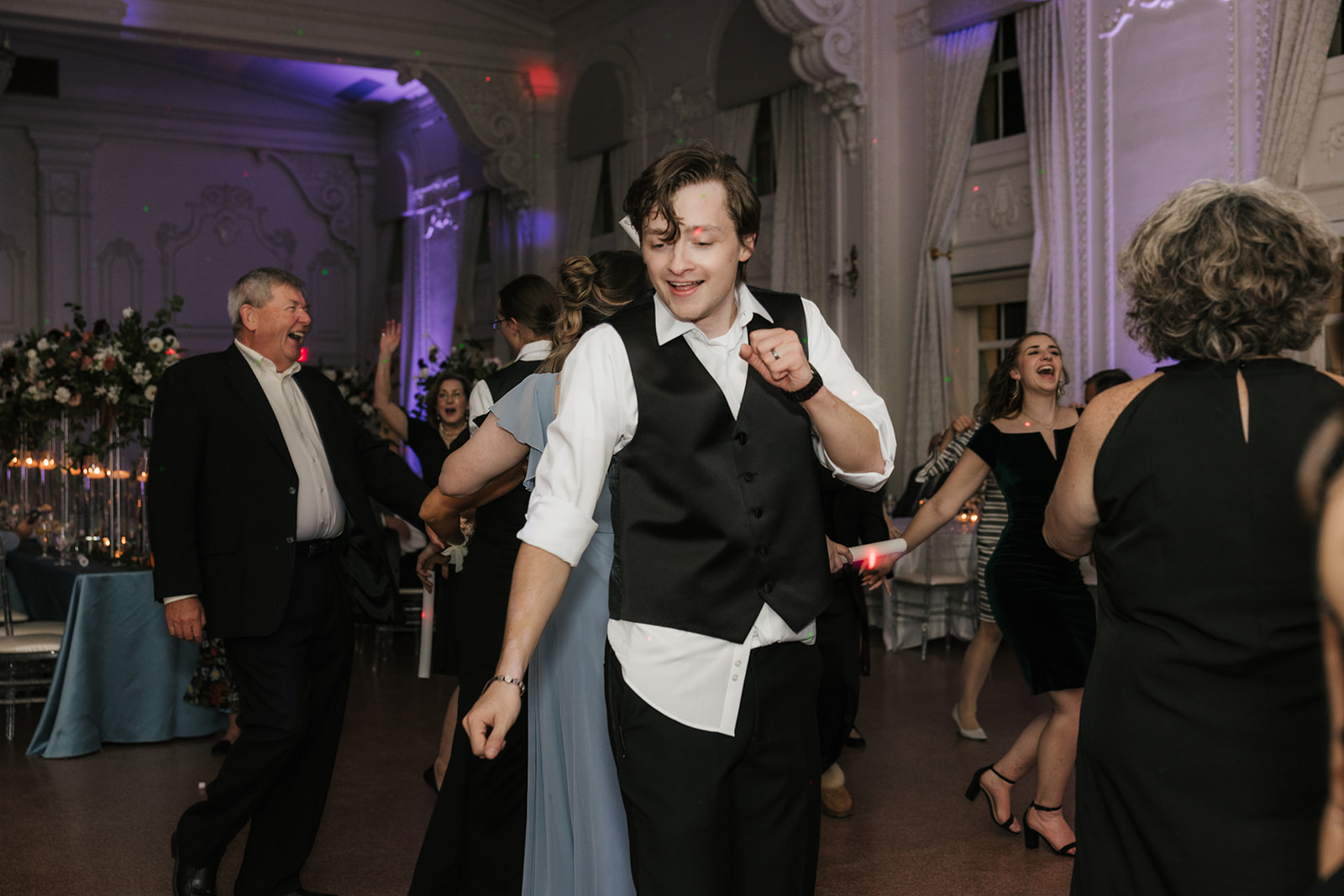 People dancing on the dance floor and having fun for a wedding reception at the mayo hotel 