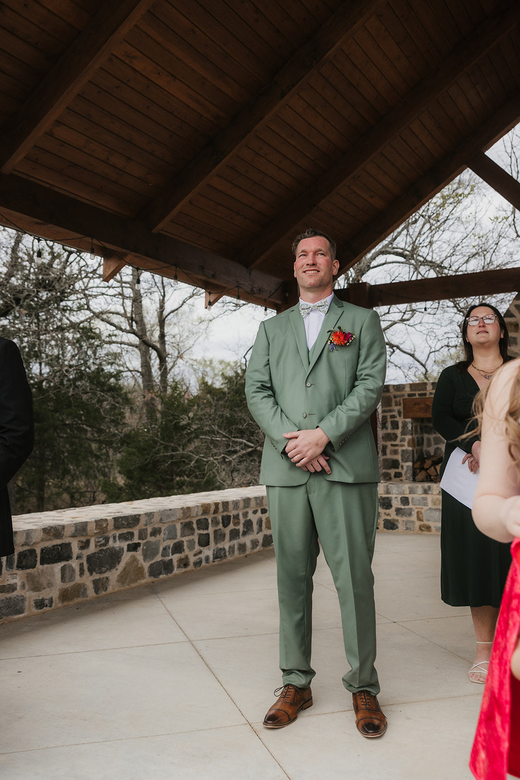 couple has a wedding ceremony outdoors at Discoveryland Ranch