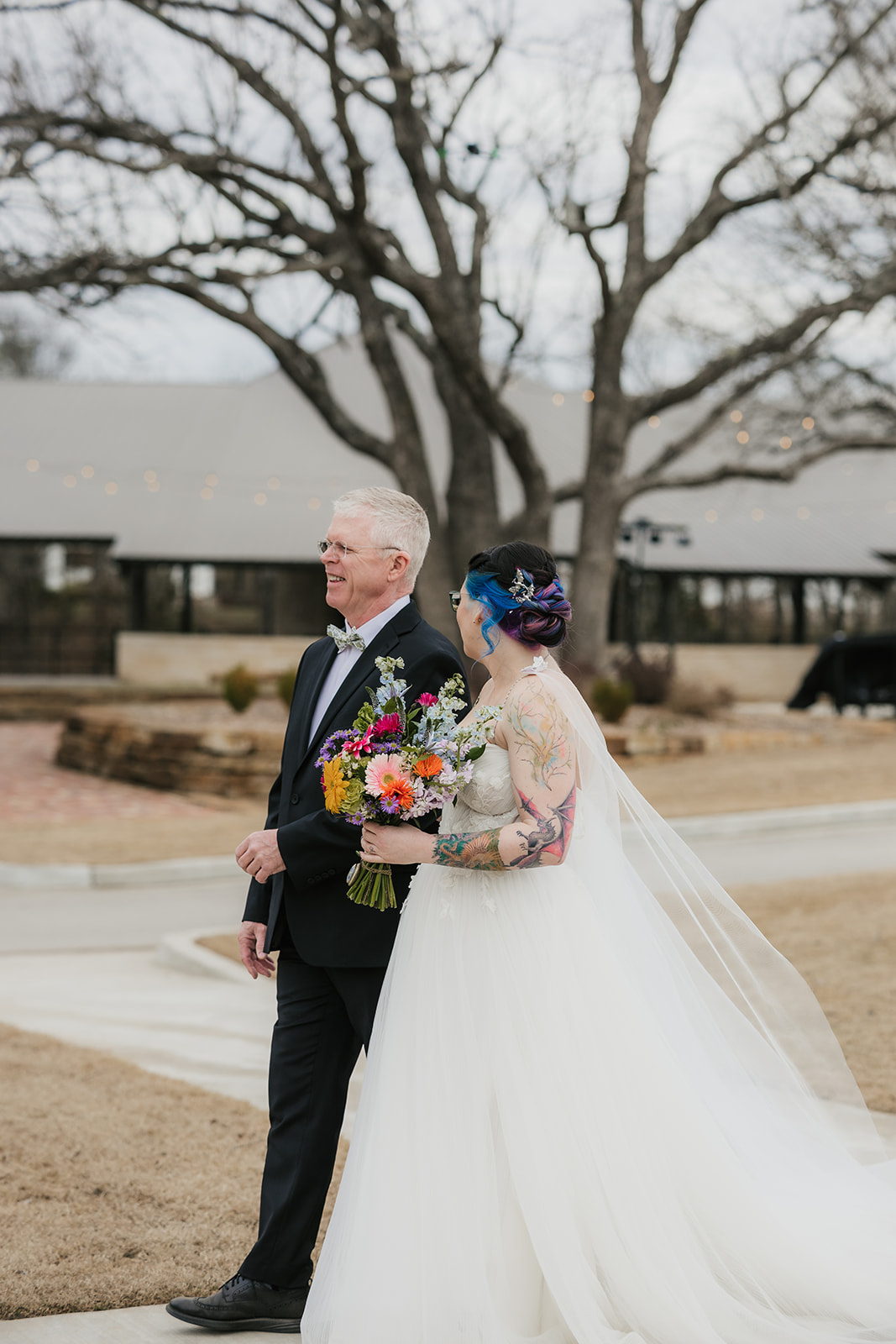 couple has a wedding ceremony outdoors at Discoveryland Ranch