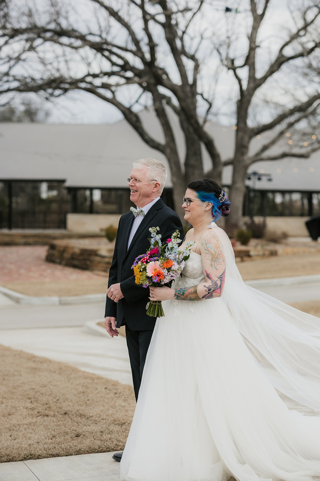 couple has a wedding ceremony outdoors at Discoveryland Ranch