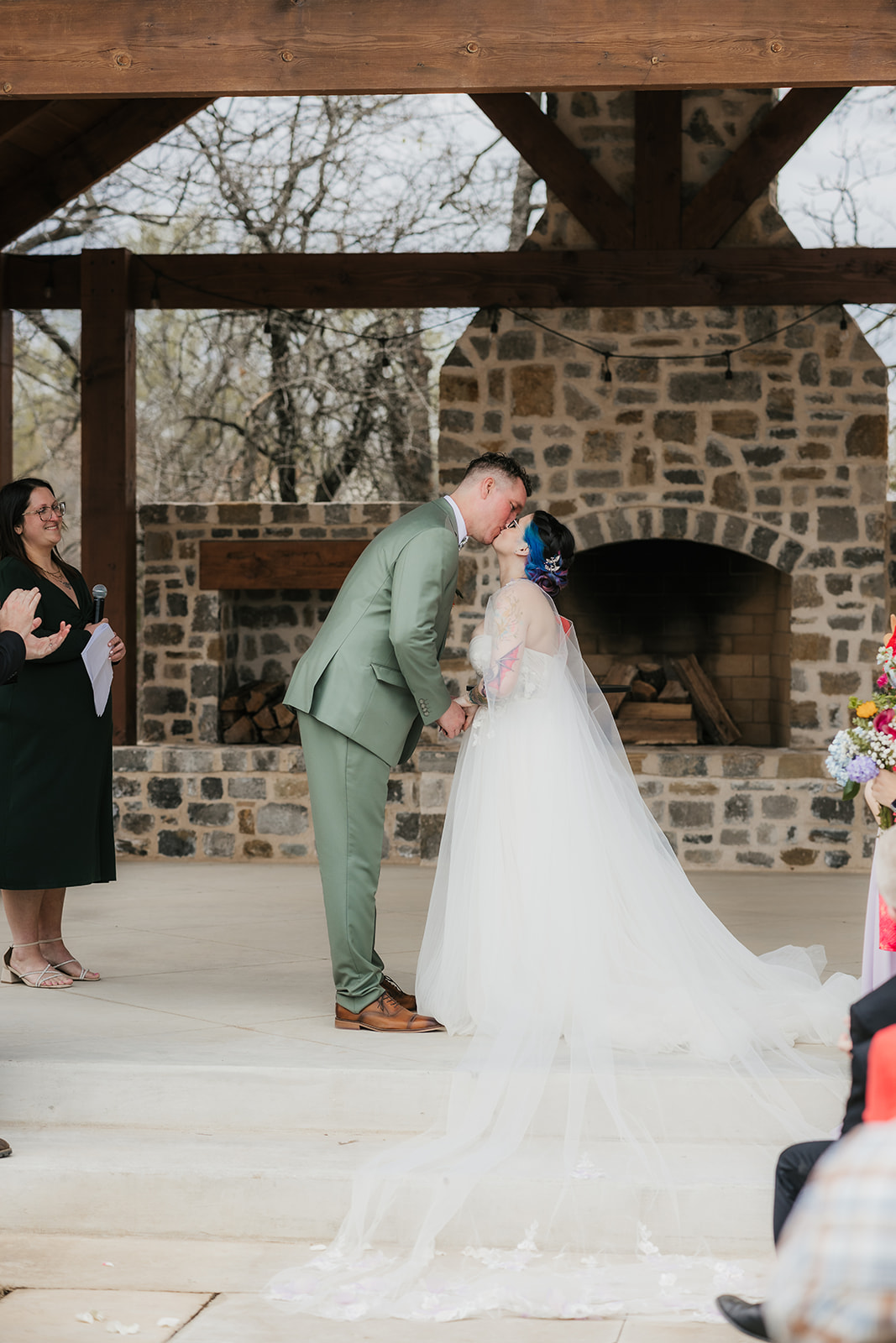 couple has a wedding ceremony outdoors at Discoveryland Ranch