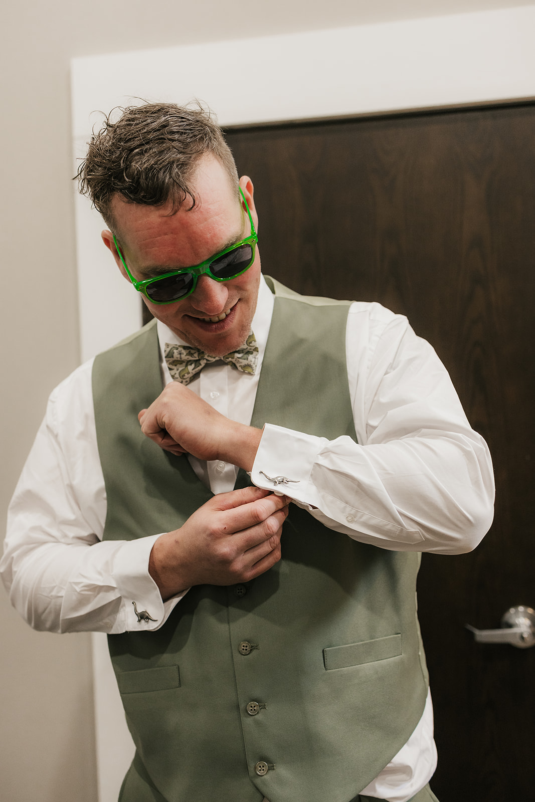 groom getting ready for his wedding at Discoveryland Ranch