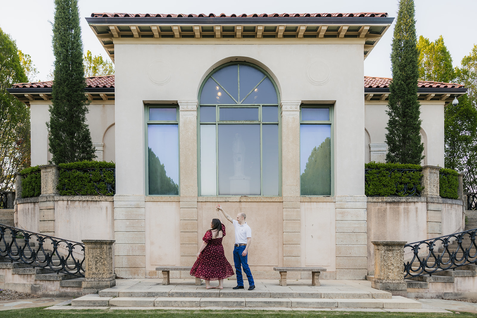 couple takes engagement photos at the Philbrook Museum of Art