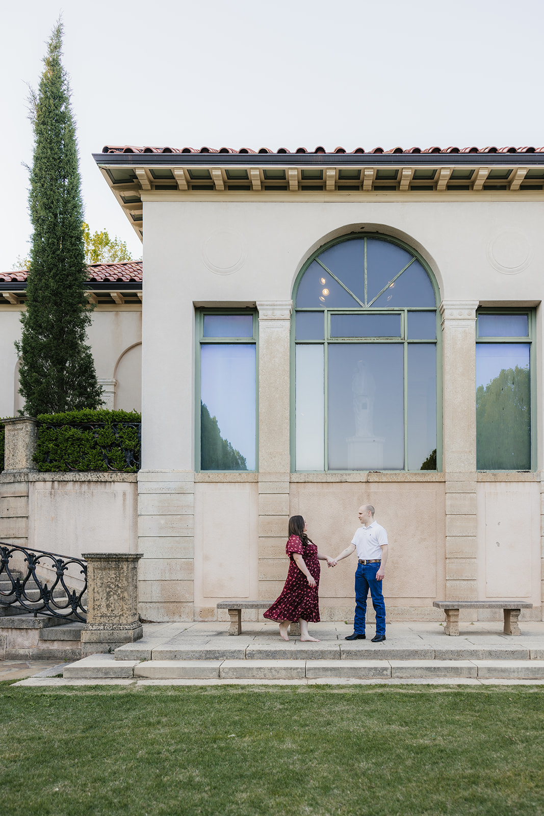 couple takes engagement photos at the Philbrook Museum of Art