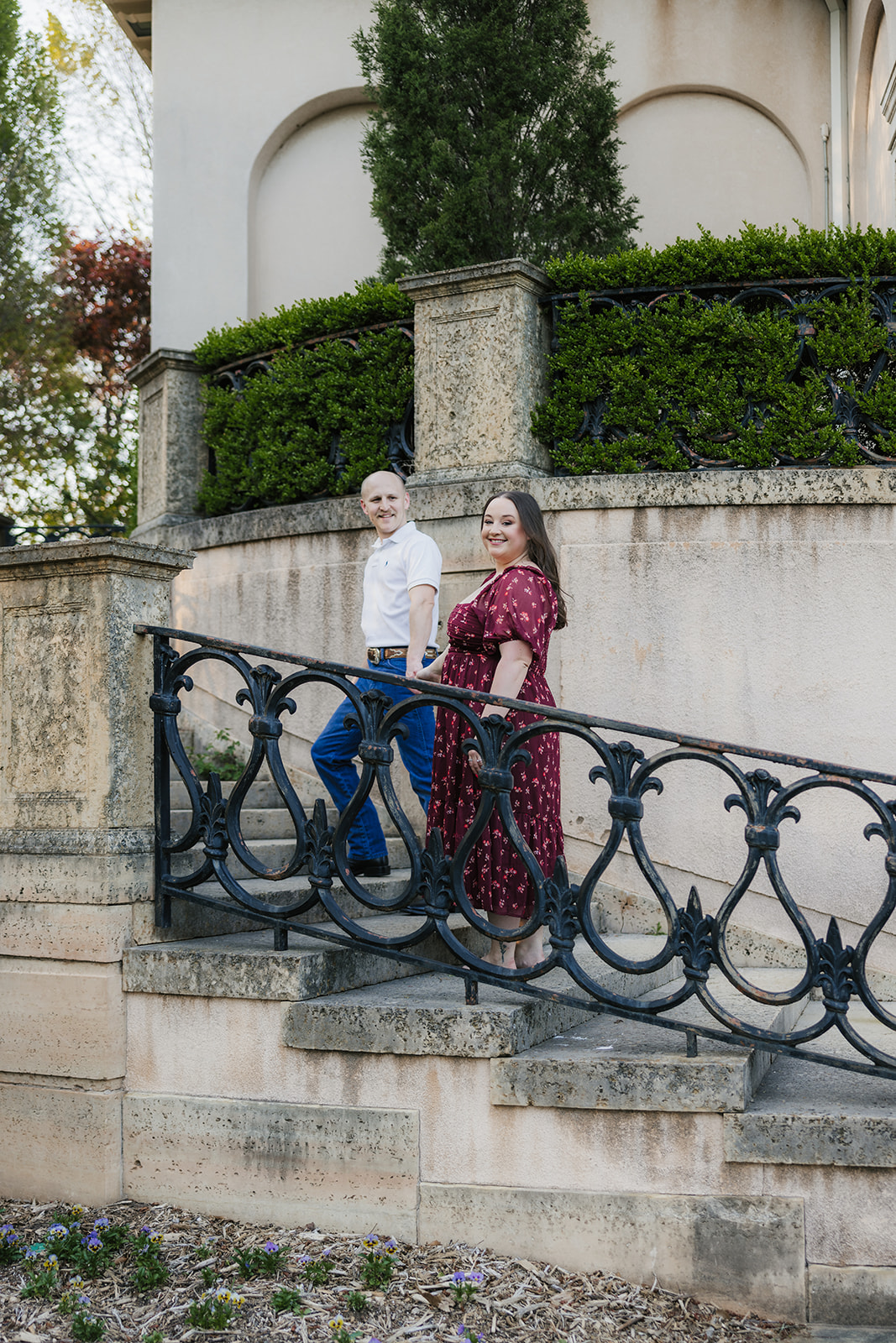couple takes engagement photos at the Philbrook Museum of Art