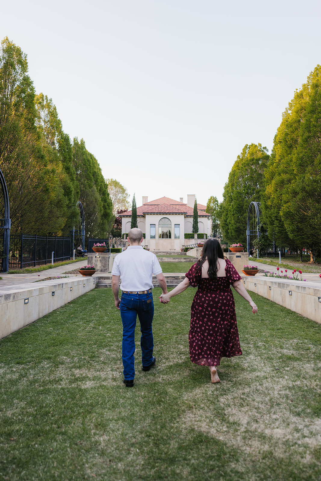 couple takes engagement photos at the Philbrook Museum of Art