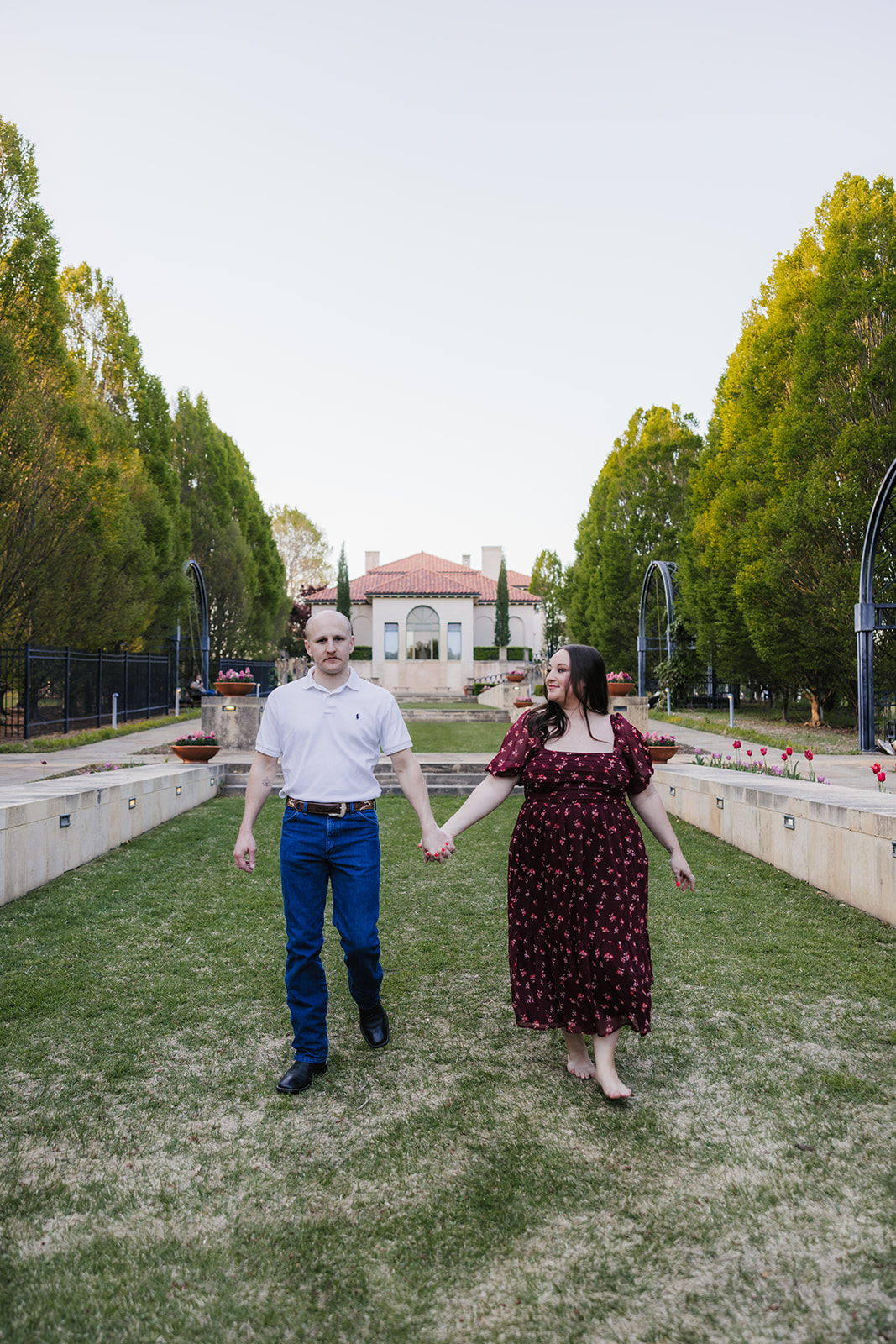 couple takes engagement photos at the Philbrook Museum of Art