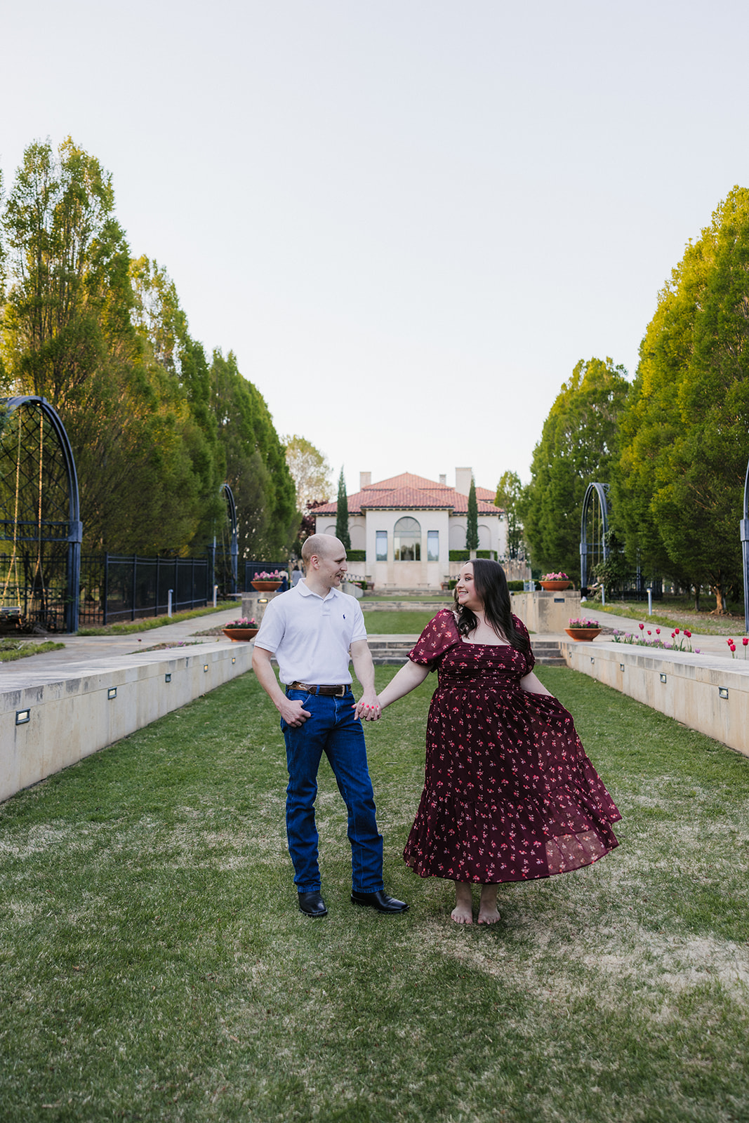 couple takes engagement photos at the Philbrook Museum of Art
