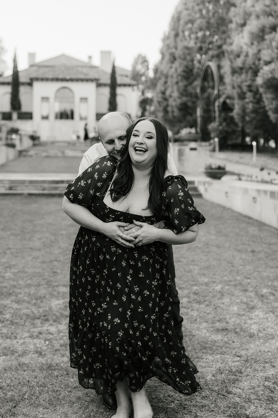 couple takes engagement photos at the Philbrook Museum of Art