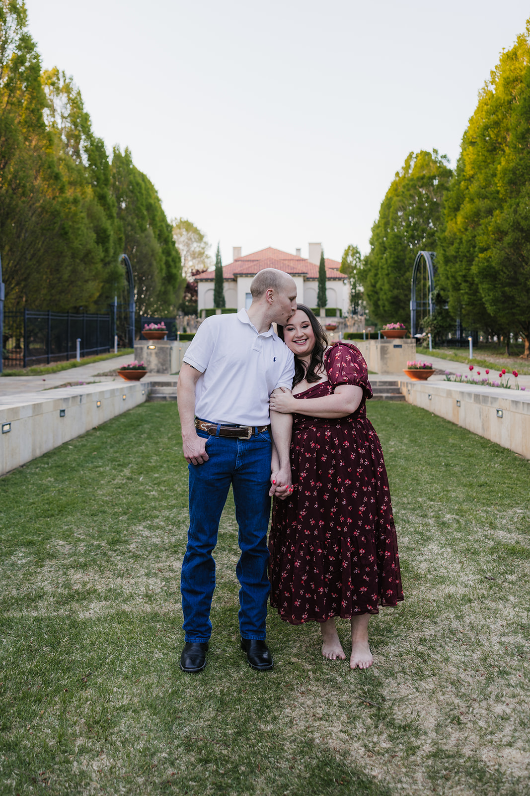couple takes engagement photos at the Philbrook Museum of Art