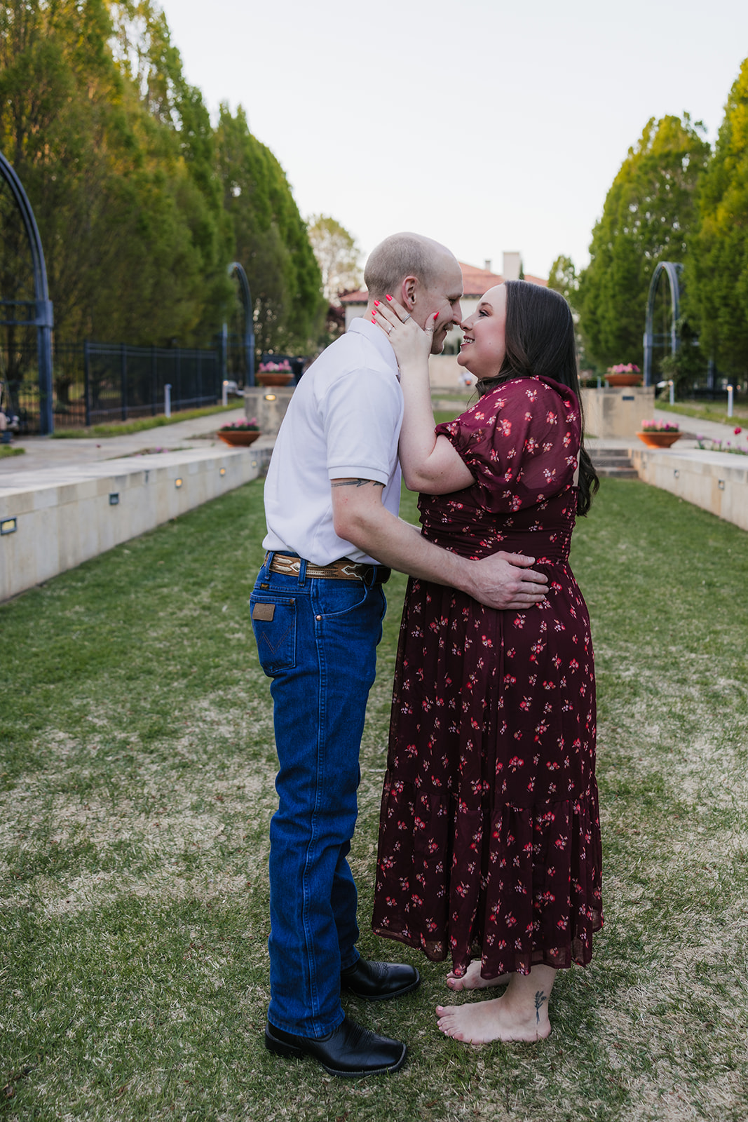 couple takes engagement photos at the Philbrook Museum of Art