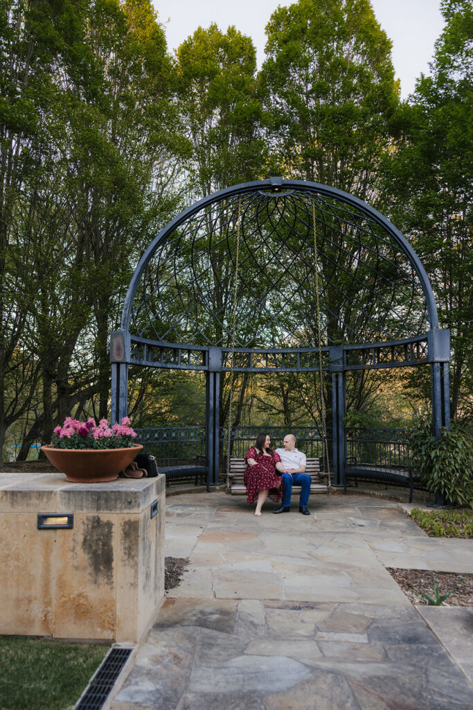 couple takes engagement photos at the Philbrook Museum of Art