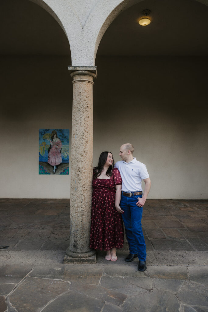 couple takes engagement photos at the Philbrook Museum of Art