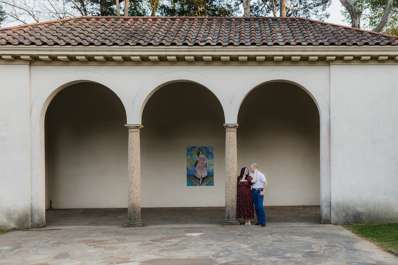 couple takes engagement photos at the Philbrook Museum of Art