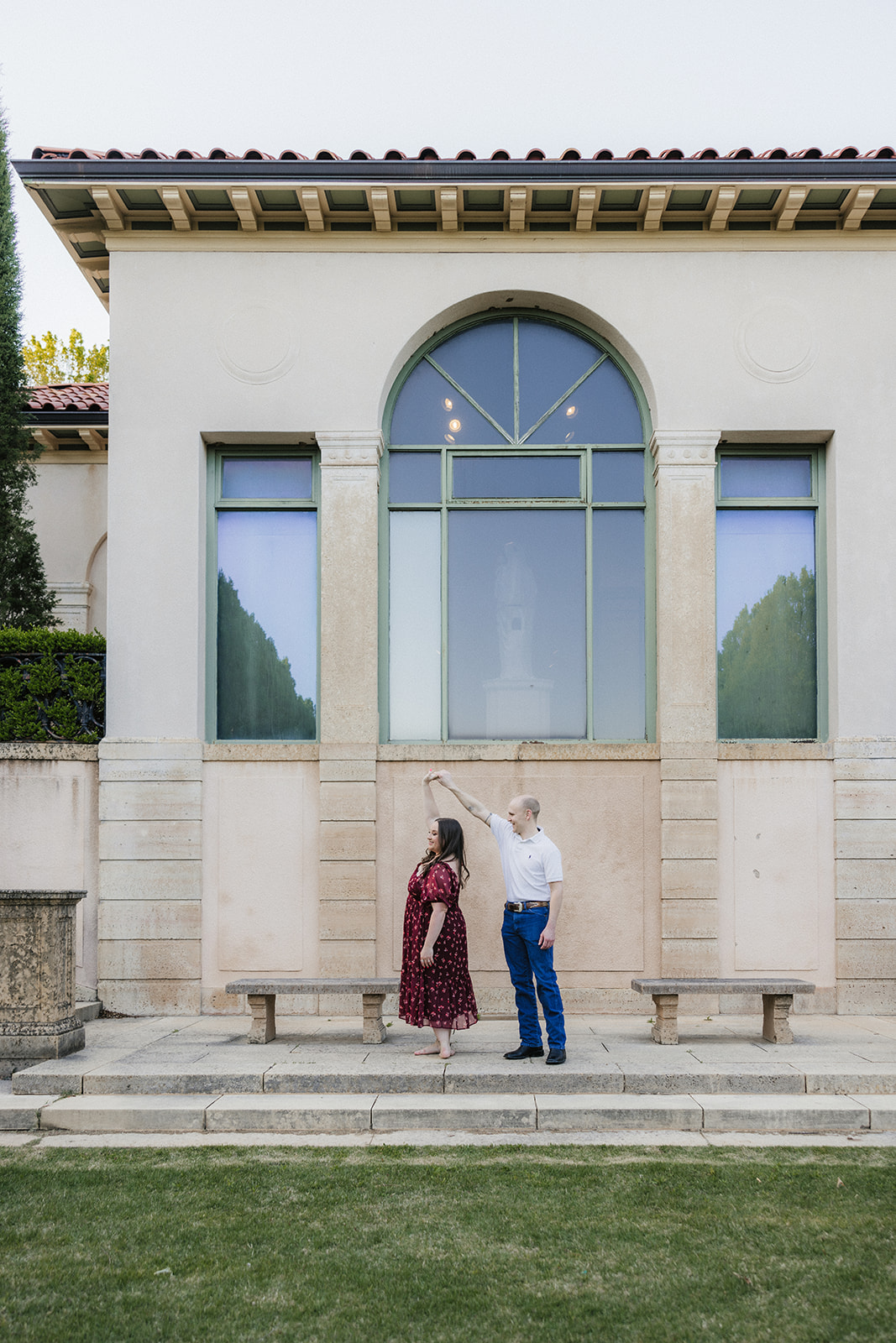 couple takes engagement photos at the Philbrook Museum of Art
