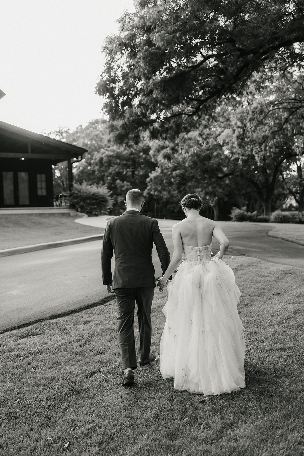 bride and groom take wedding portraits at Spain ranch