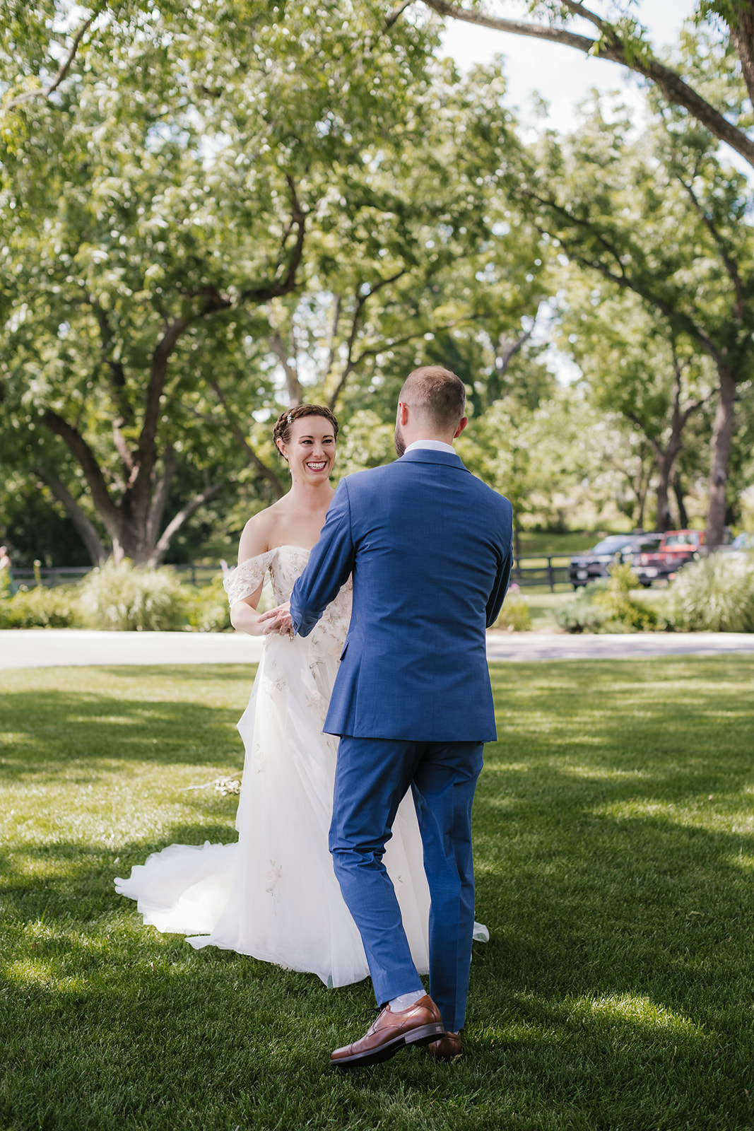 bride and groom having a first look at their wedding at spain ranch