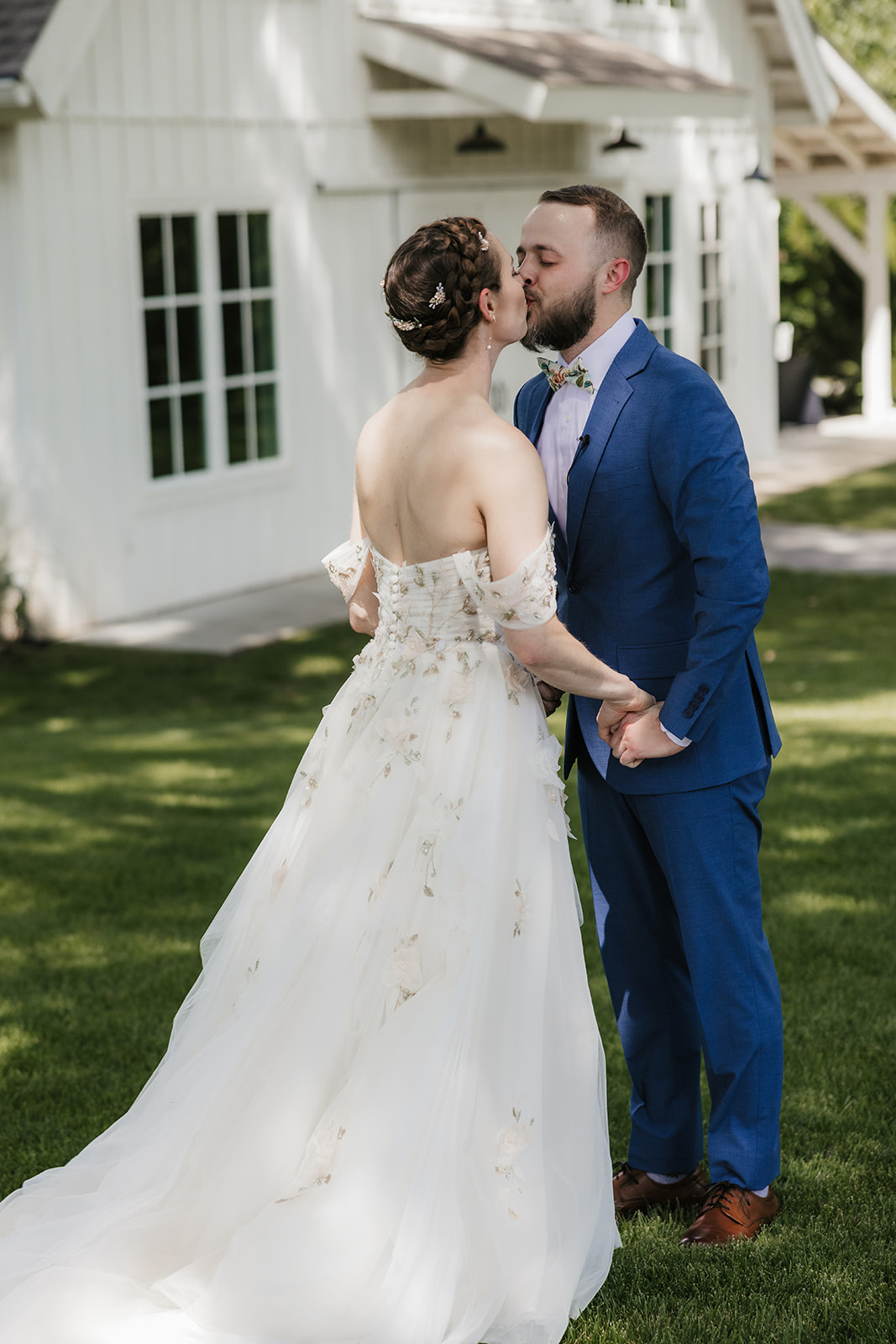 bride and groom having a first look at their wedding at spain ranch