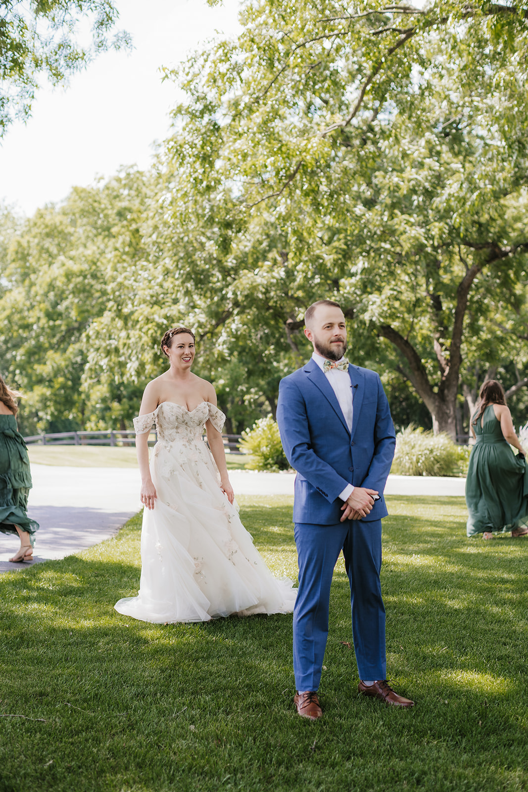 bride and groom having a first look at their wedding at spain ranch