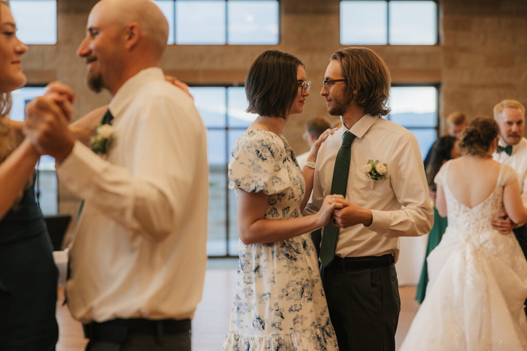 people dancing on the dance floor at a celebration