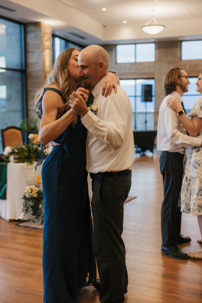 people dancing on the dance floor at a celebration