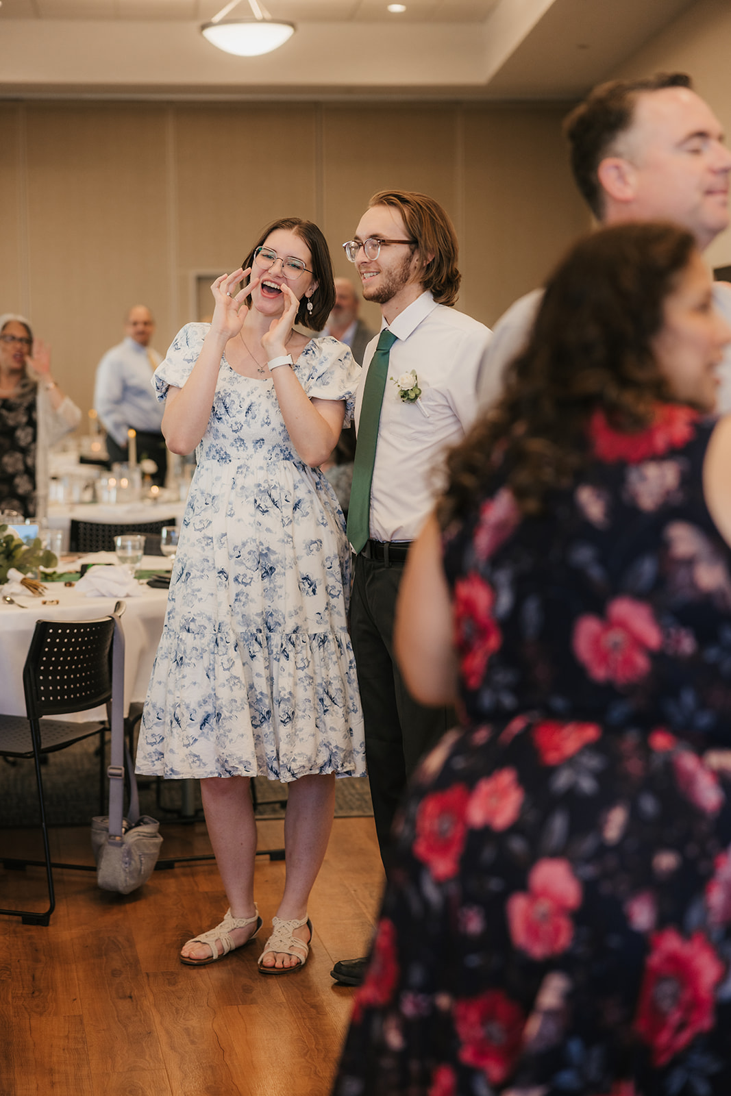 people dancing on the dance floor at a celebration