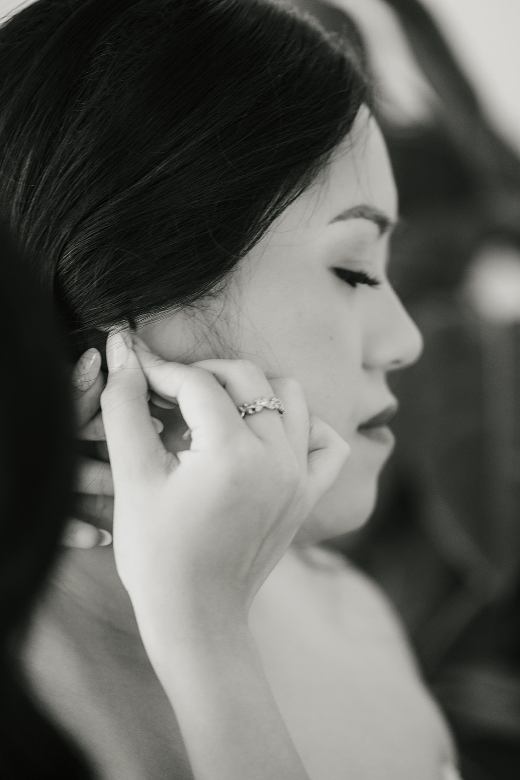 bride getting ready on her wedding day at spain ranch