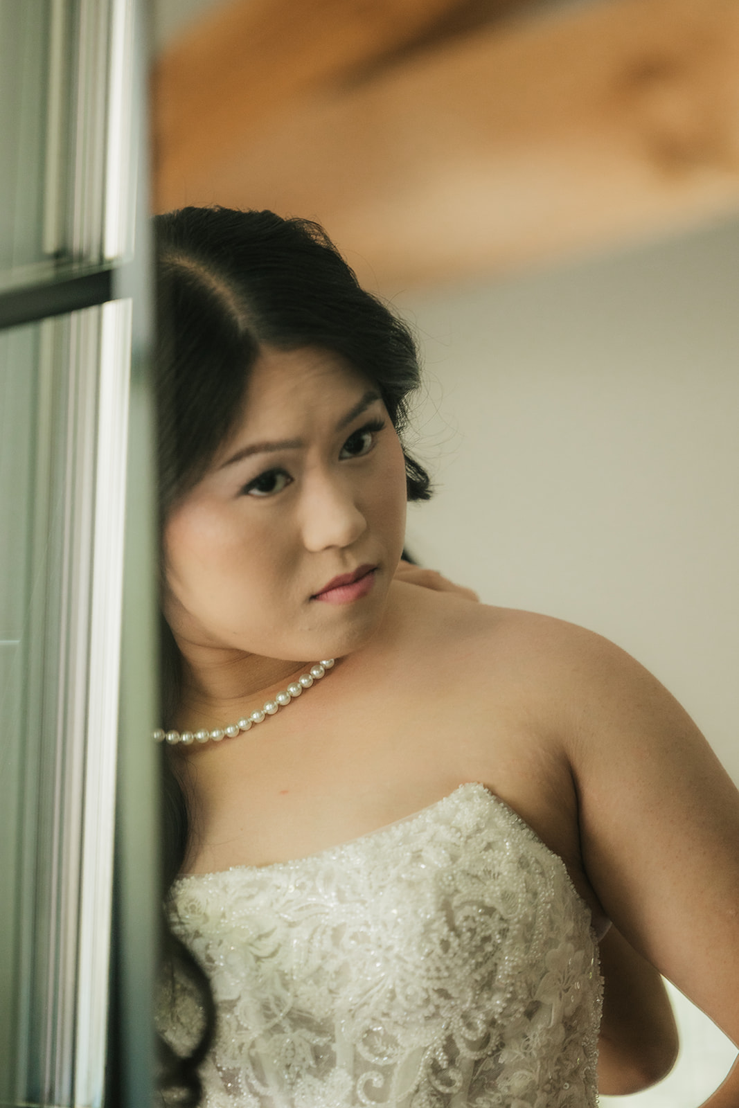 bride getting ready on her wedding day at spain ranch