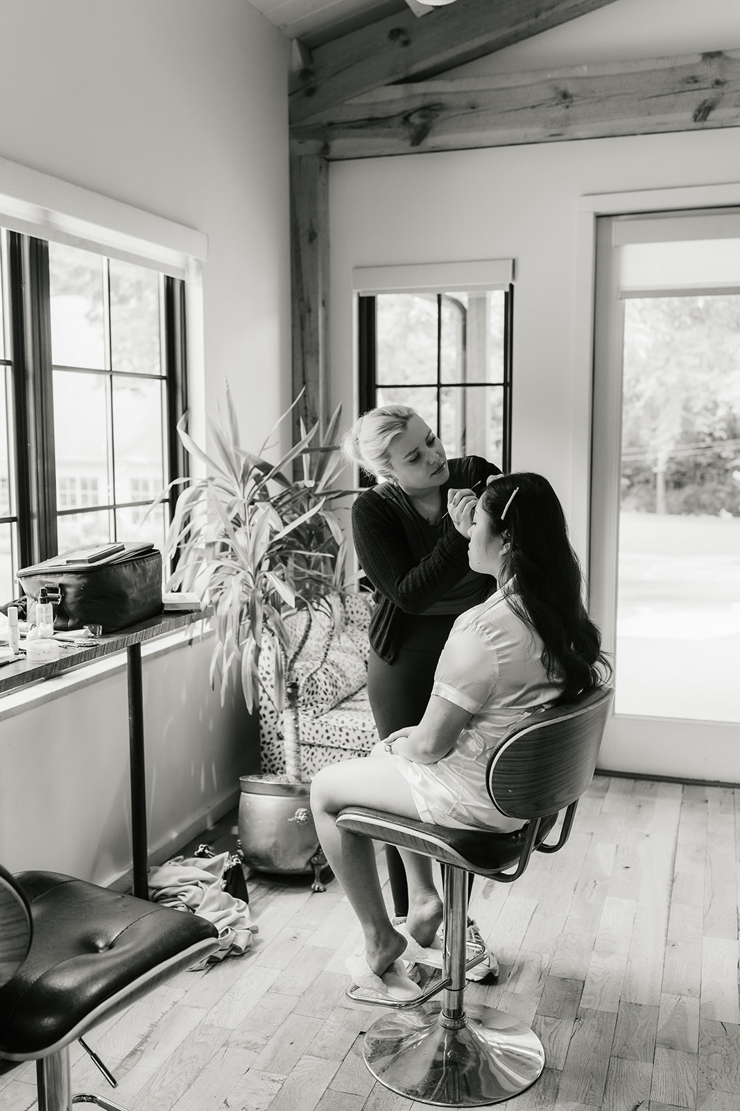 bride getting ready on her wedding day at spain ranch