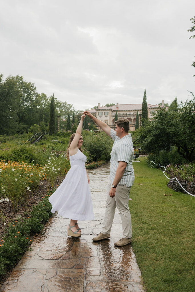 a couple has a romantic engagement session Philbrook Museum in Tulsa Oklahoma 