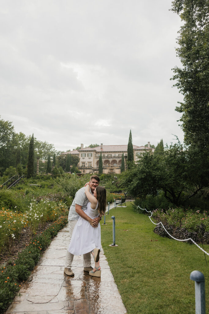 a couple has a romantic engagement session Philbrook Museum in Tulsa Oklahoma 