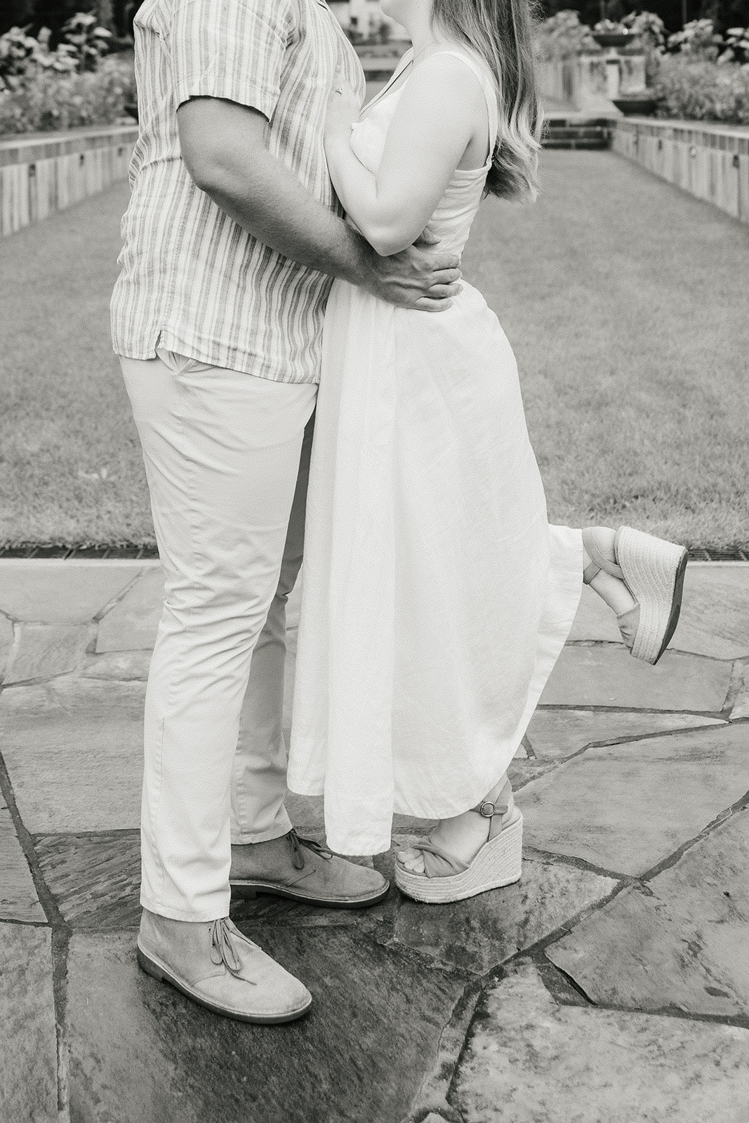 a couple has a romantic engagement session Philbrook Museum in Tulsa Oklahoma 