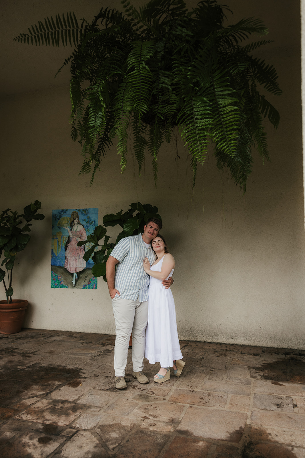 a couple has a romantic engagement session Philbrook Museum in Tulsa Oklahoma 