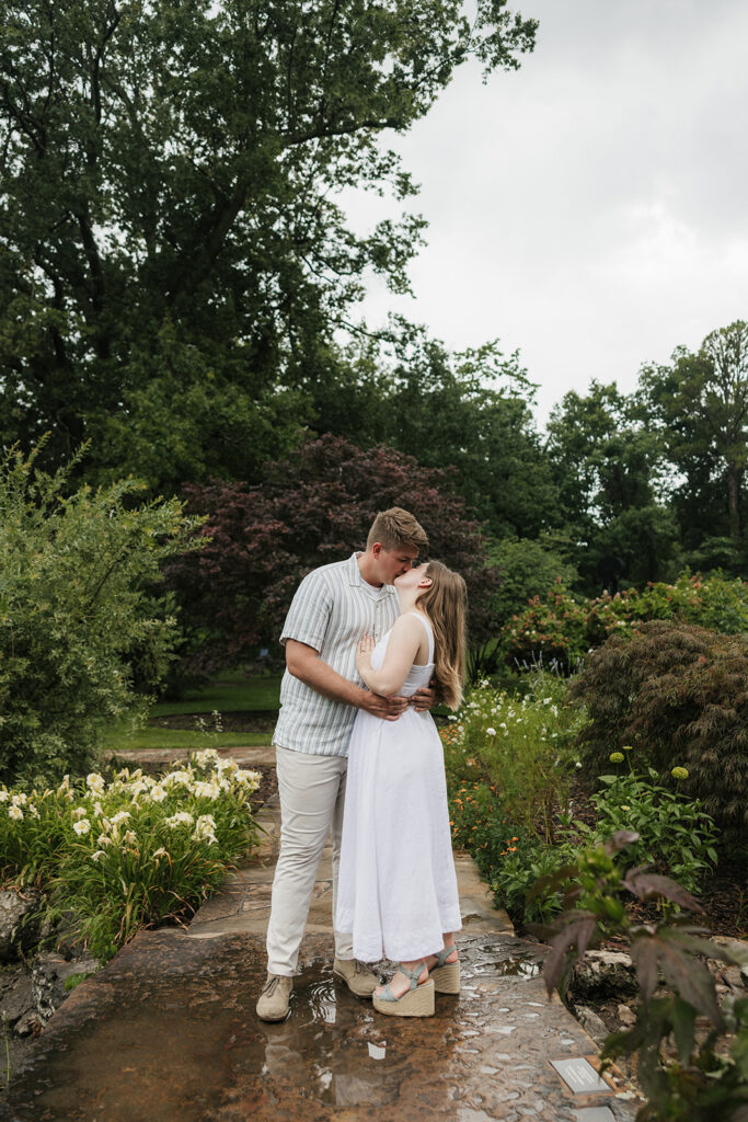 a couple has a romantic engagement session Philbrook Museum in Tulsa Oklahoma 