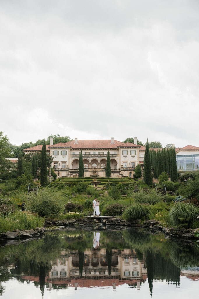a couple has a romantic engagement session Philbrook Museum in Tulsa Oklahoma 