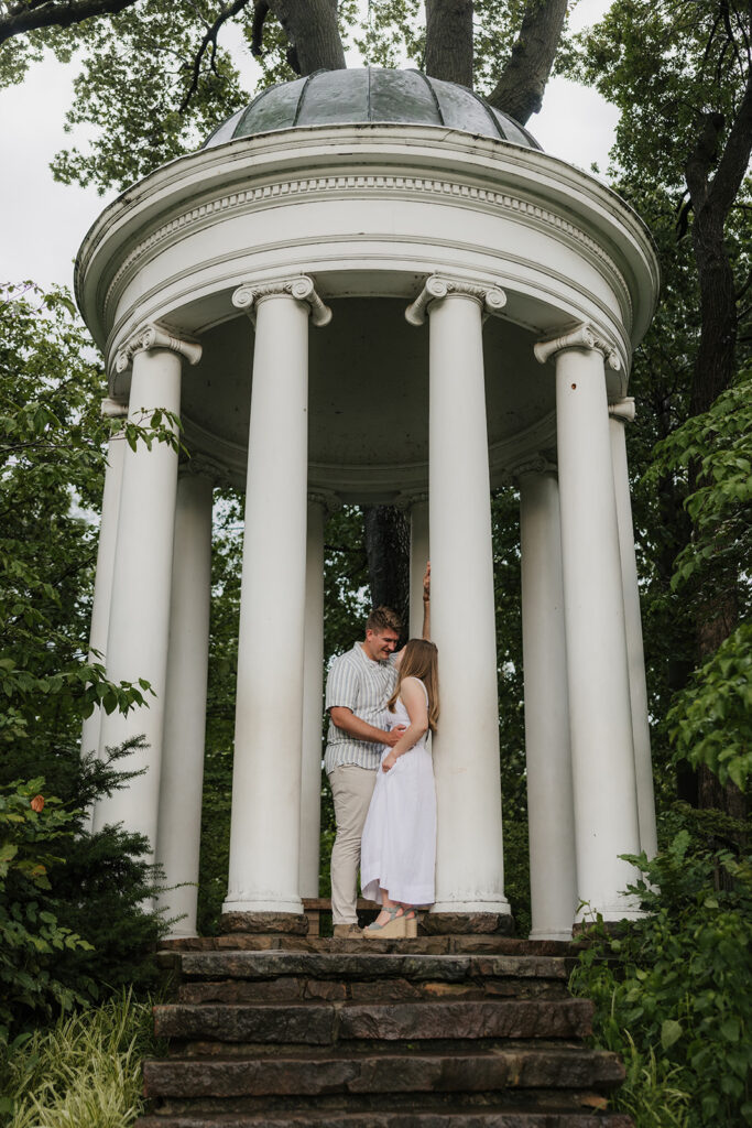 a couple has a romantic engagement session Philbrook Museum in Tulsa Oklahoma 
