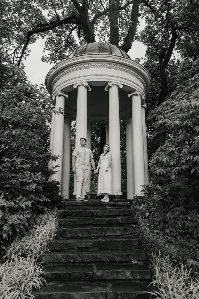 a couple has a romantic engagement session Philbrook Museum in Tulsa Oklahoma 