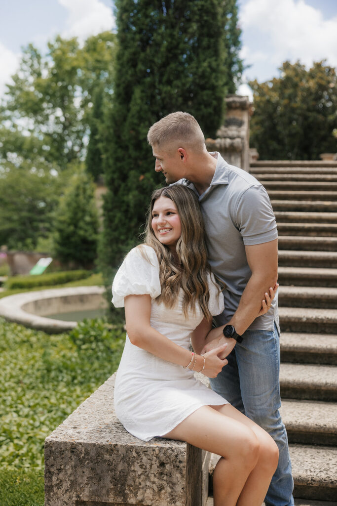 fiance kissing his fiance on the forehead
