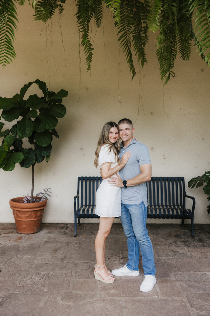 couple smiling at the camera during their session