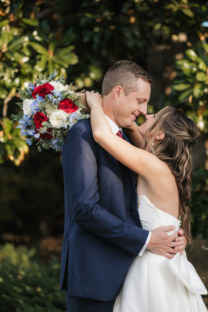 cute picture of the bride and groom kissing