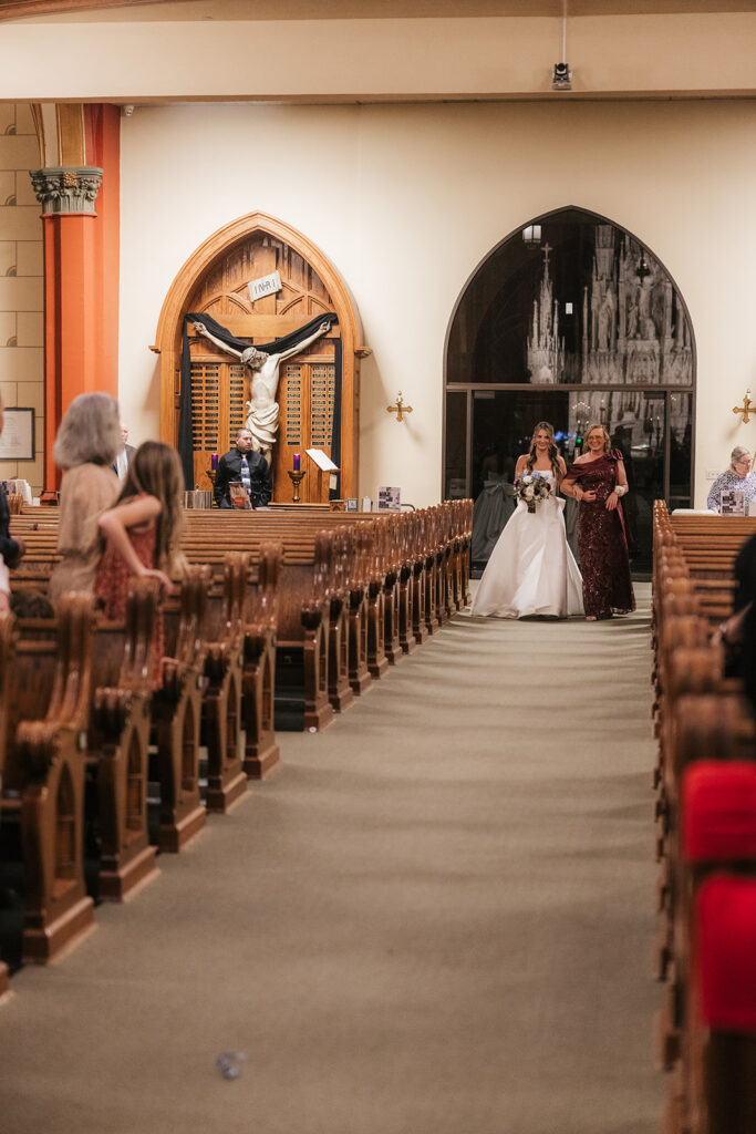 stunning picture of the bride walking down the aisle